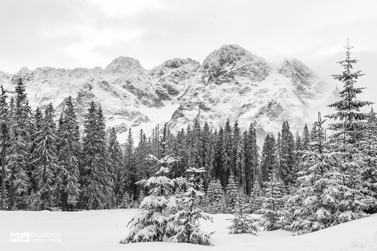 Black and white winter photography of Tatra mountains in Poland by Jeff Baumgart