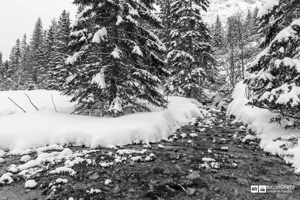 Black and white winter photography of Tatra mountains in Poland by Jeff Baumgart