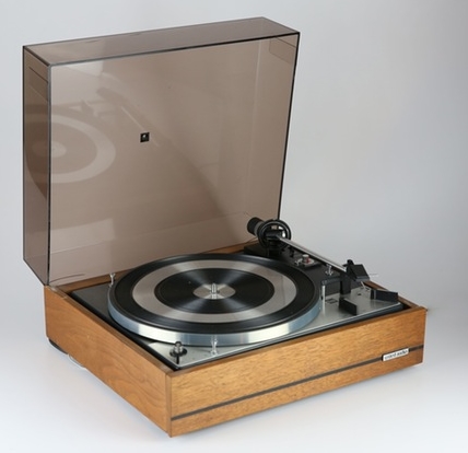 Dual 1219 Automatic Record Changer and United Audio turntable cabinet.