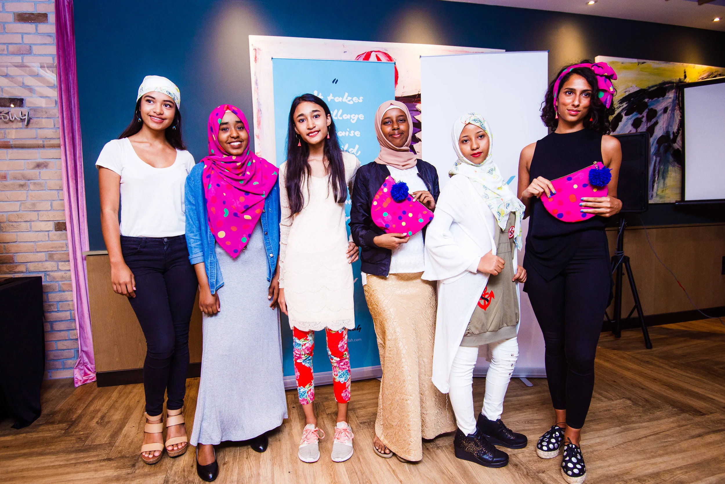 Some of the Fugee School students and Deborah's sister, Rachel, modeling the accessories at the Fugeelah launch!