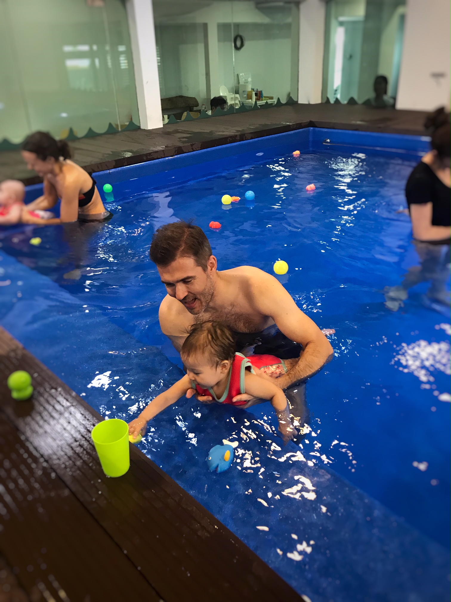 The joy of finding little treasures scattered around the pool encourages babies to reach and extend their arms!