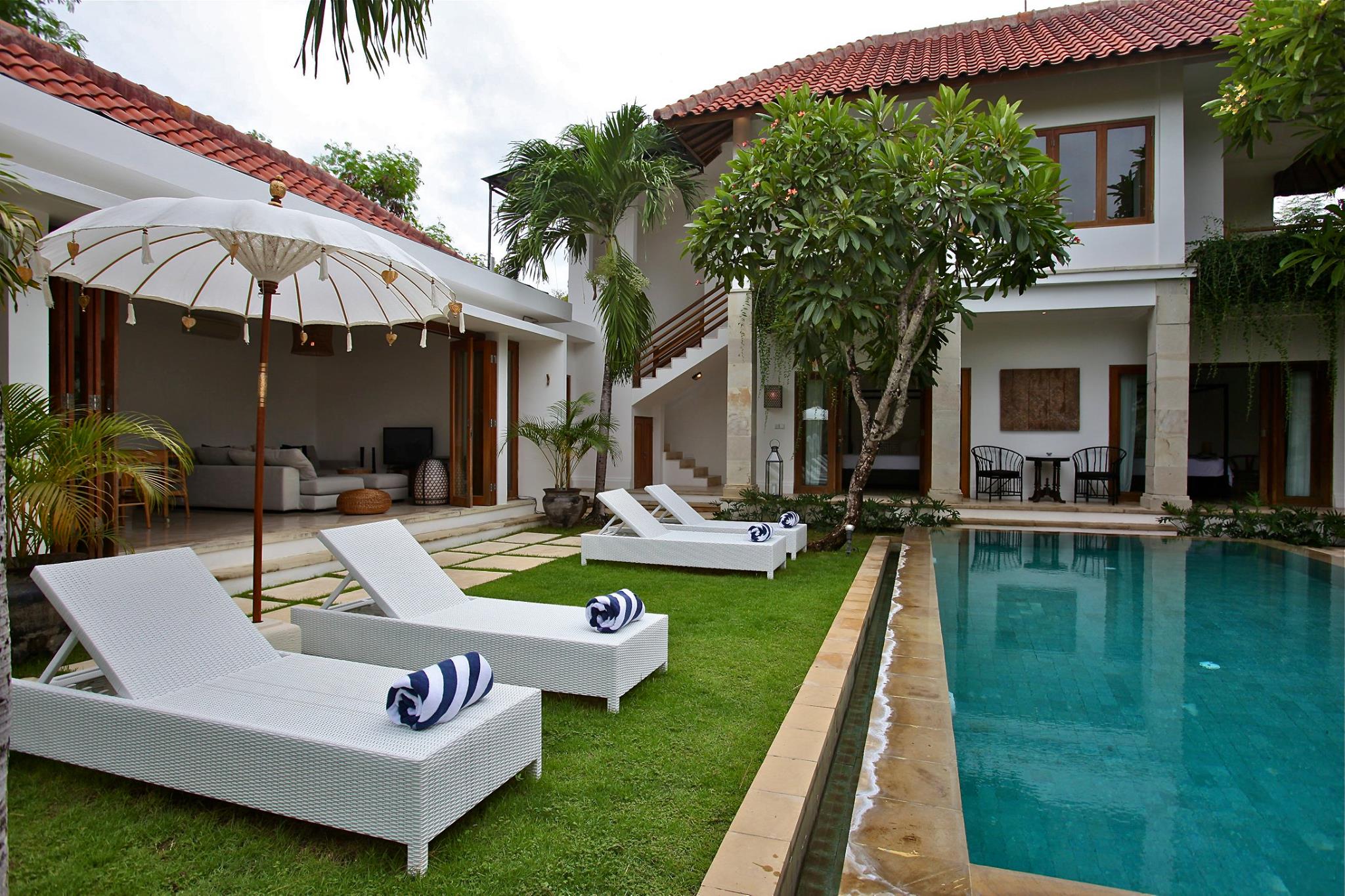 Resort in Bali with sun loungers and pool