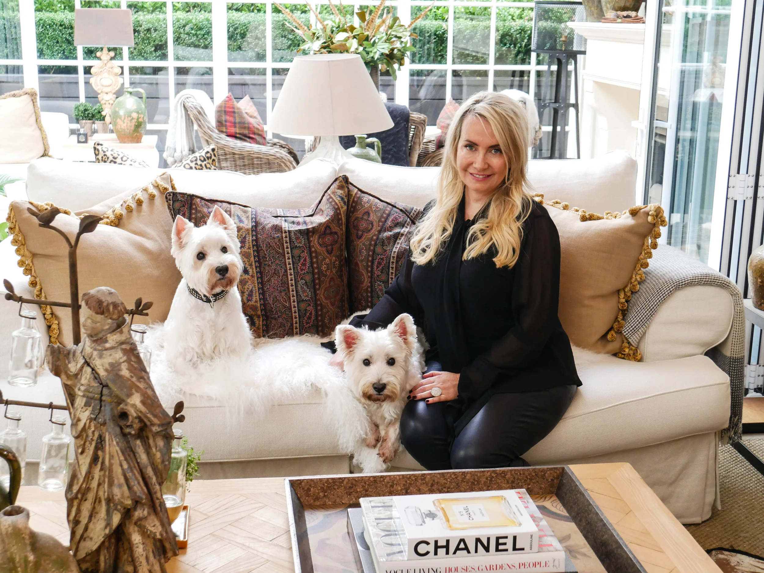 Mary Gordon at home with her west highland white terriers Dougal and Rebus.