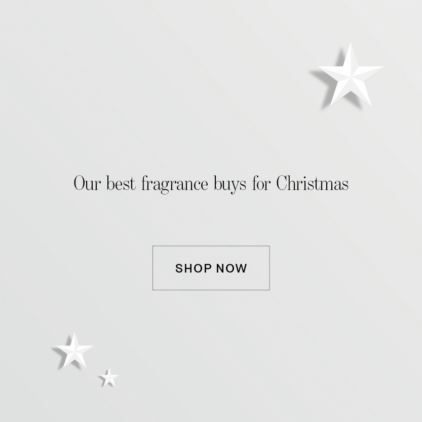 A range of different fragrances against a grey background