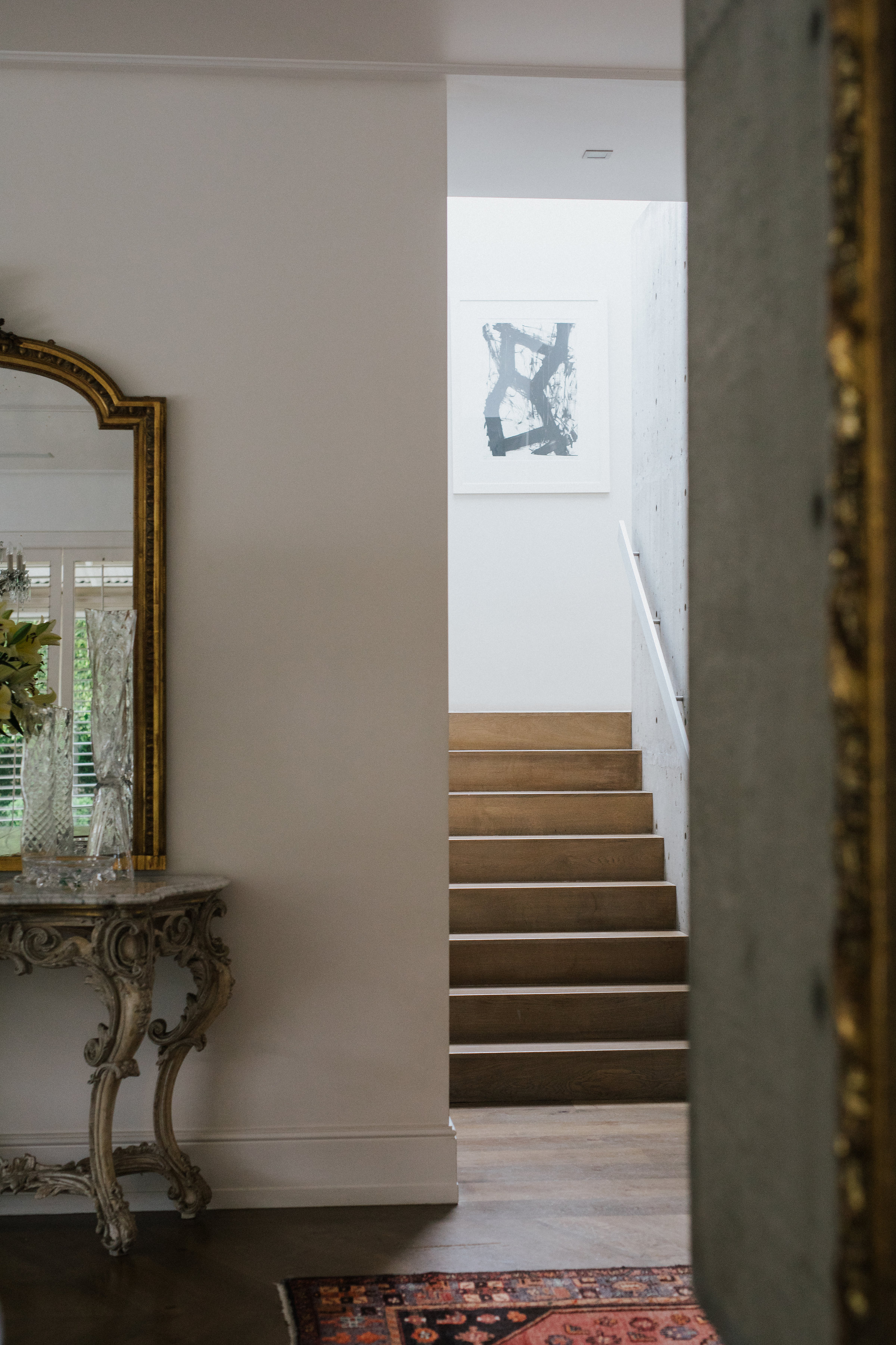 Corridor with stairs going up 