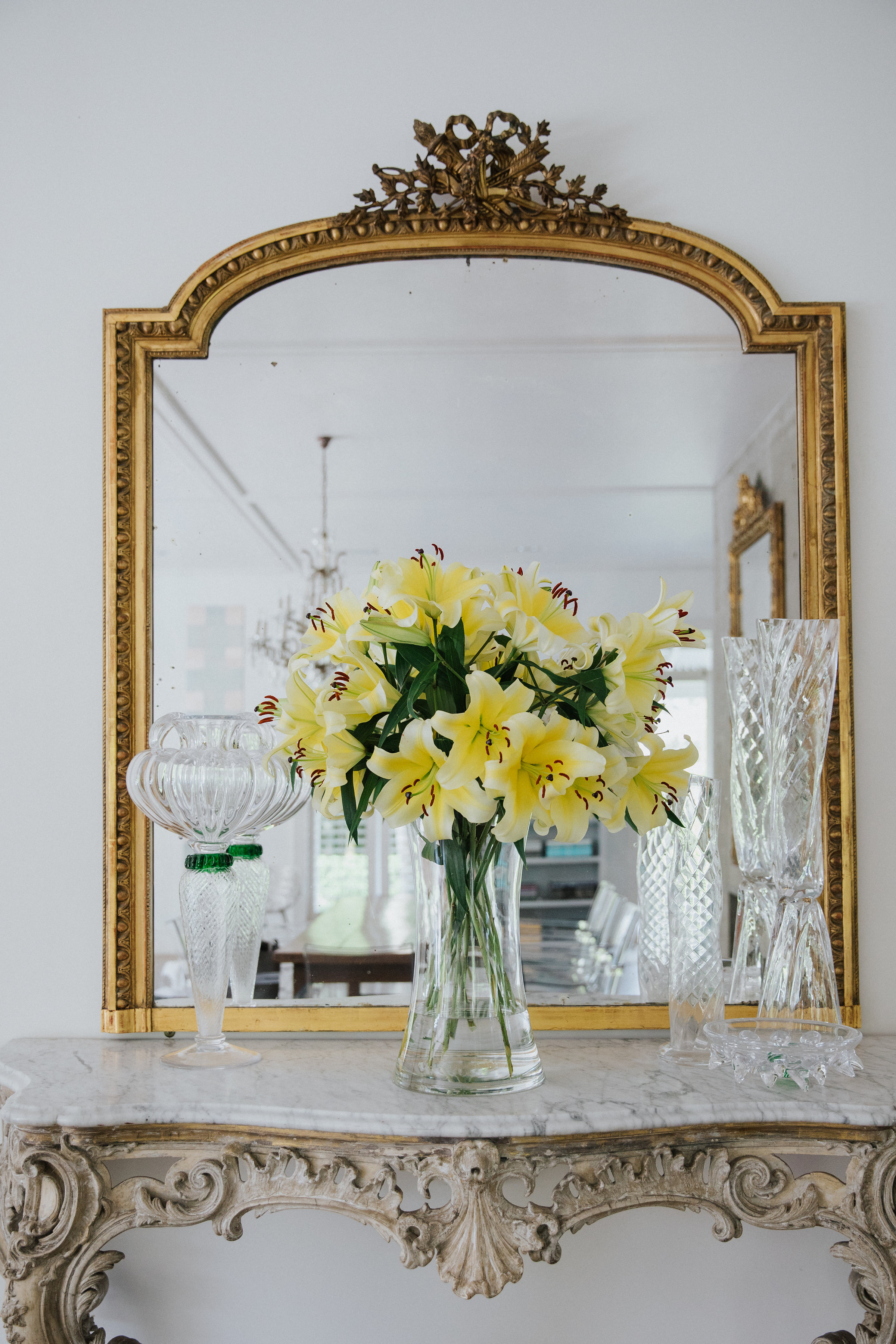 Mirror and yellow flowers