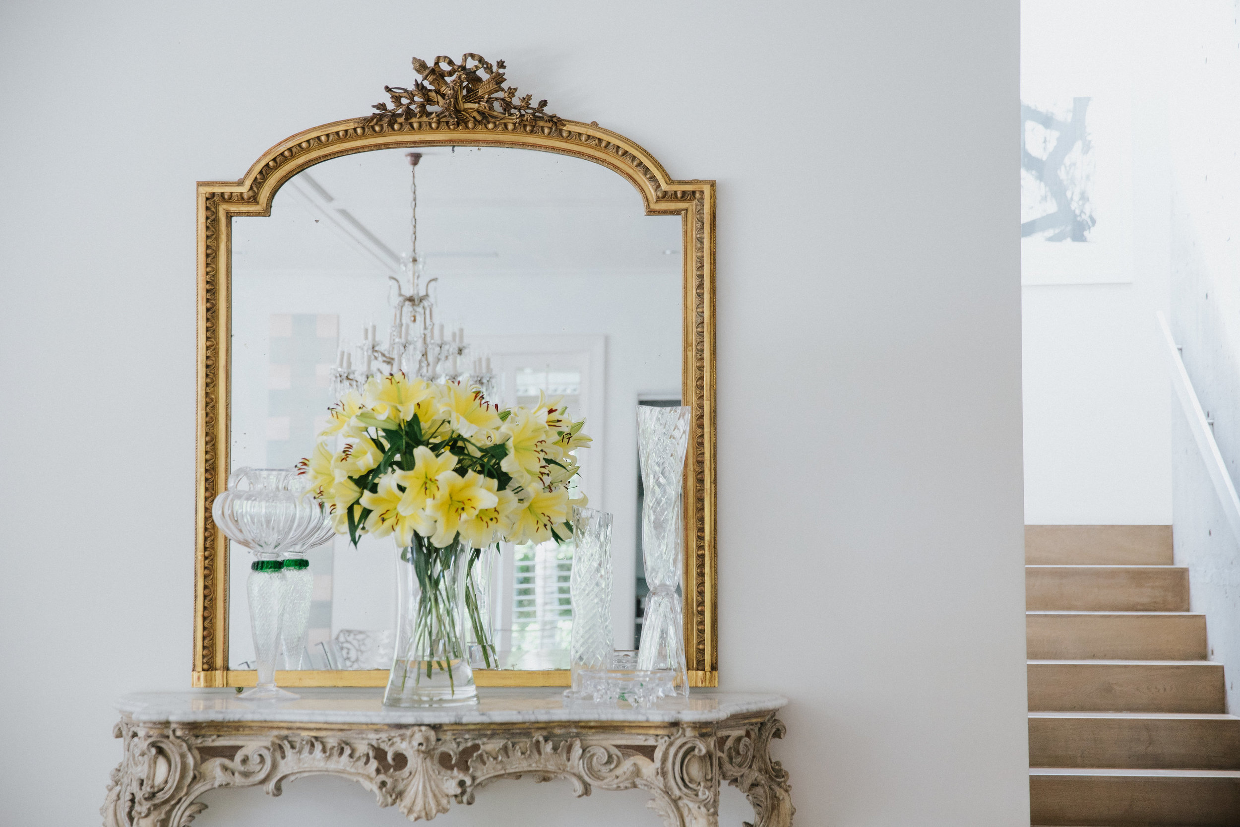 Mirror and yellow flowers