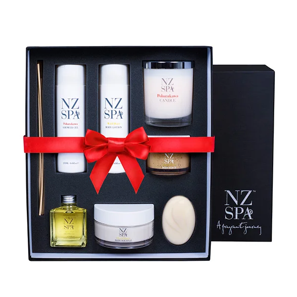 NZ spa ultimate gift pack. Black box with contents inside tied together by a red ribbon