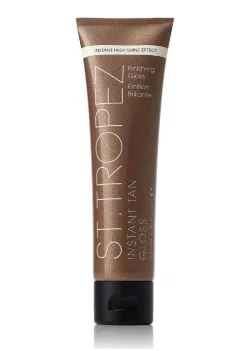 St Tropez body gloss in brown bottle sitting on black lid 