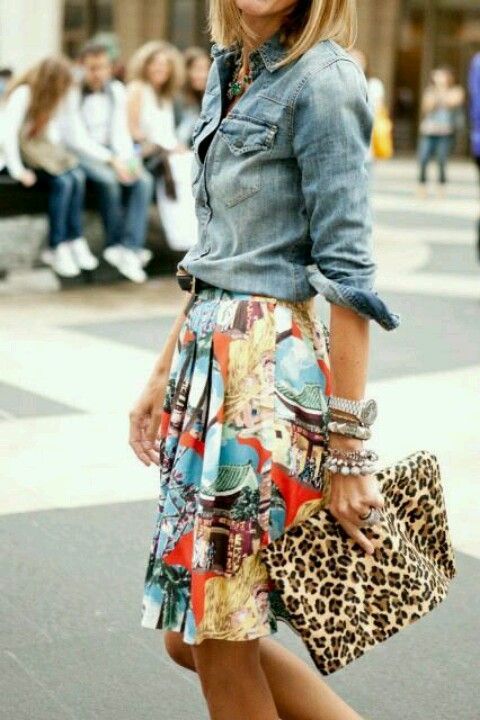 Model wearing jeans shirt and floral skirt