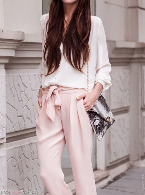 woman in white shirt and pink pants