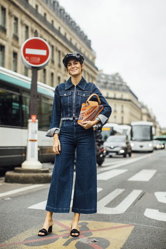 Brunette woman in double denim jeans and jacket