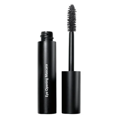 Bobbi Brown Eye-Opening Mascara. Open black bottle sitting next to lid standing up right