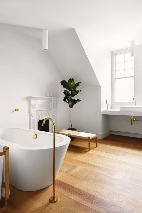 White wall bathroom and wooden floors