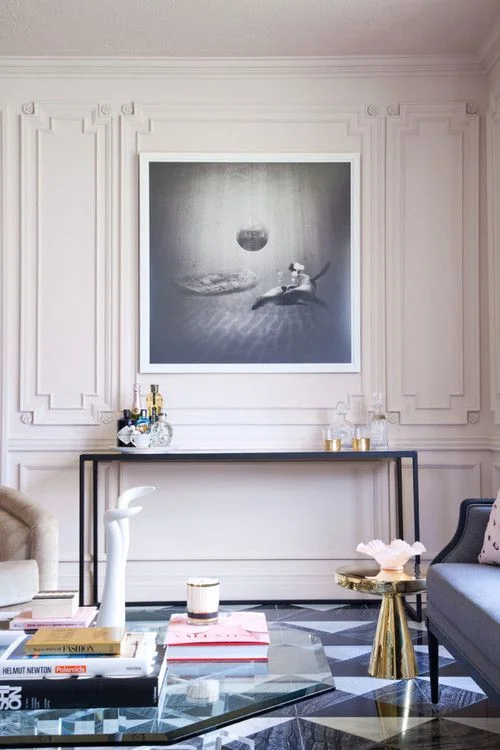modern white room with grey artwork on wall
