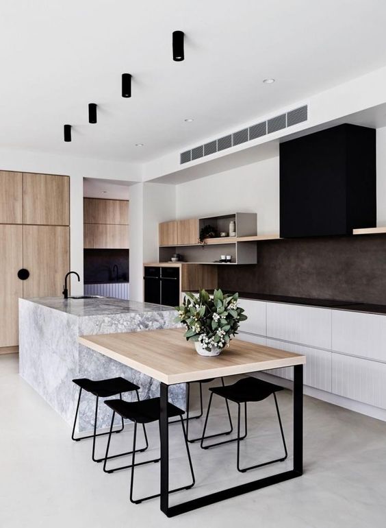 Modern kitchen with wooden table and marble bench
