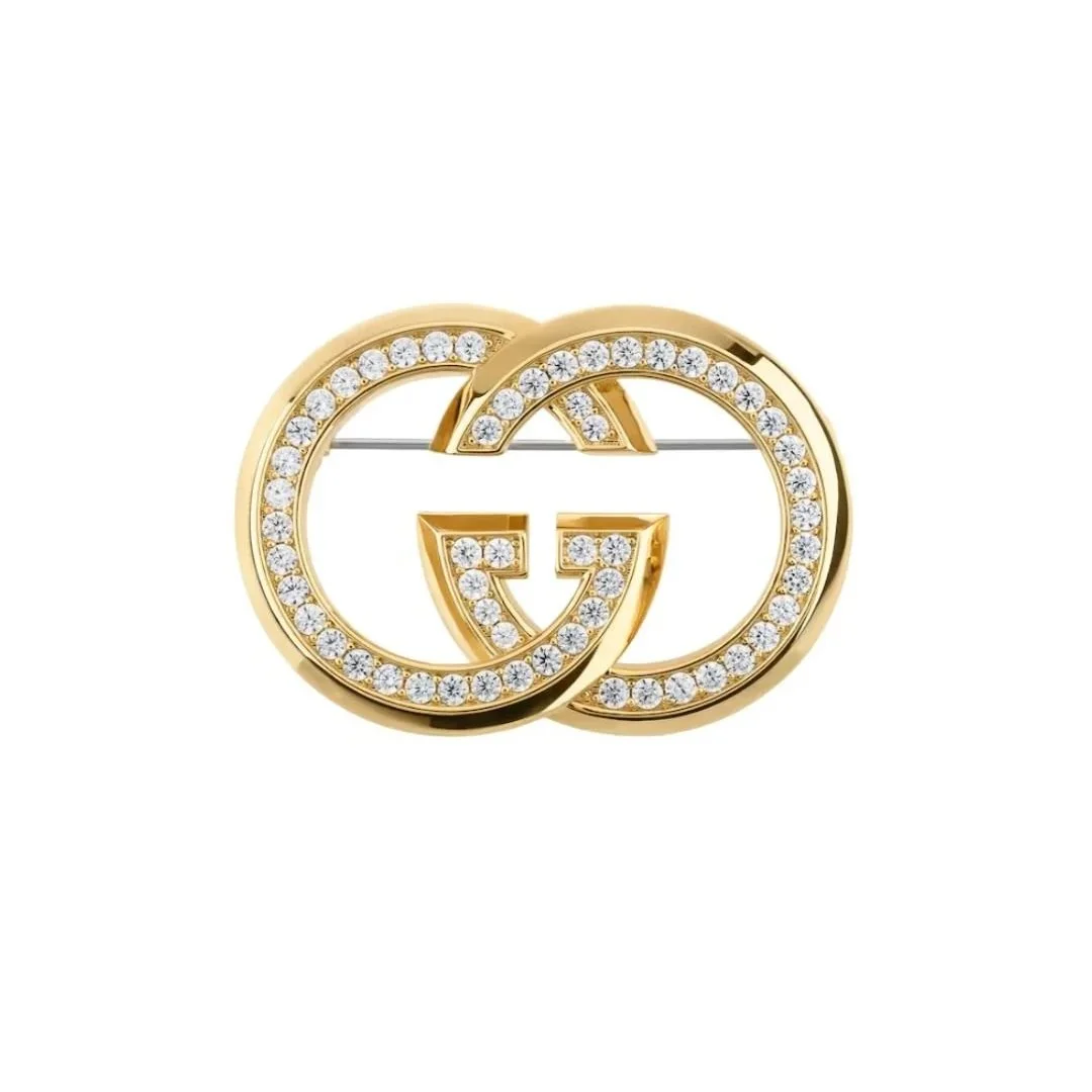 Gucci+Interlocking+crystal+brooch+.jpg