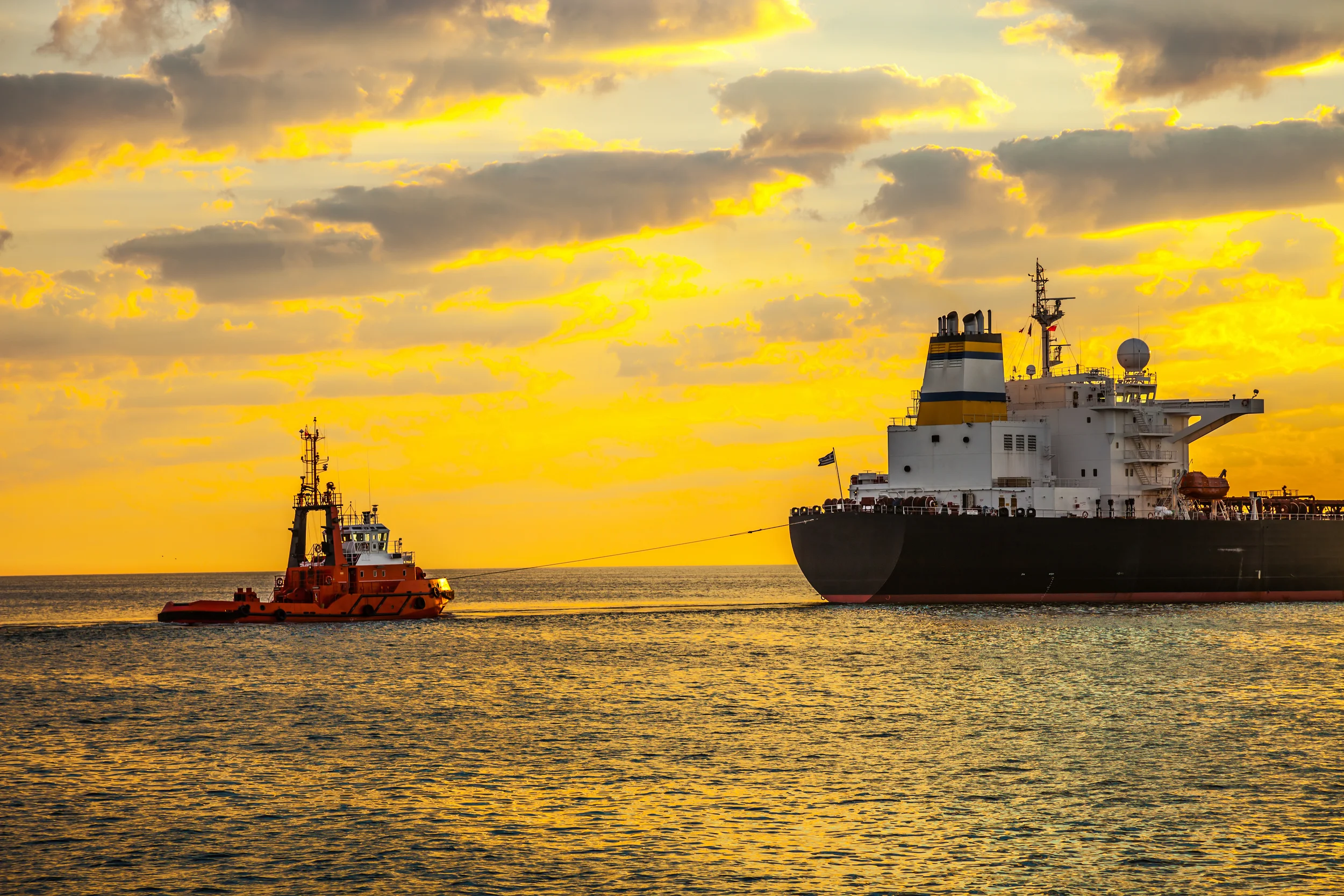 shanghai shutterstock sea ships tanker and tugboat 162194360.jpg