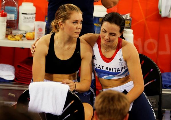 Jessica Varnish, left and Victoria Pendleton after being disqualified after the track cycling women's team sprint qualifying