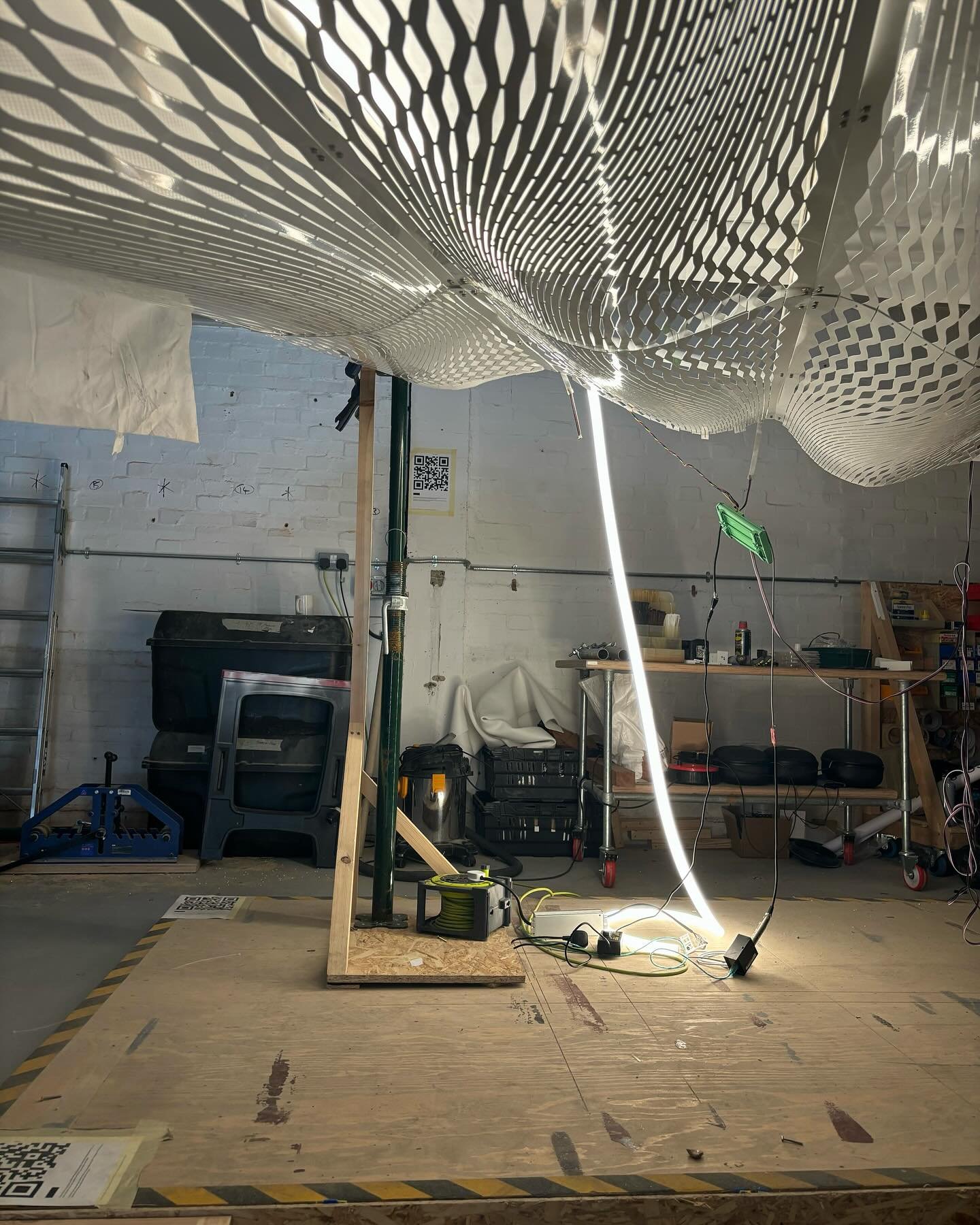 Lighting mock-ups for a really cool installation we&rsquo;re working on in the background using formed laser cut sheets which create an extraordinary play on light. More to reveal later on! #art #installation #lighting #forms #led #central #london