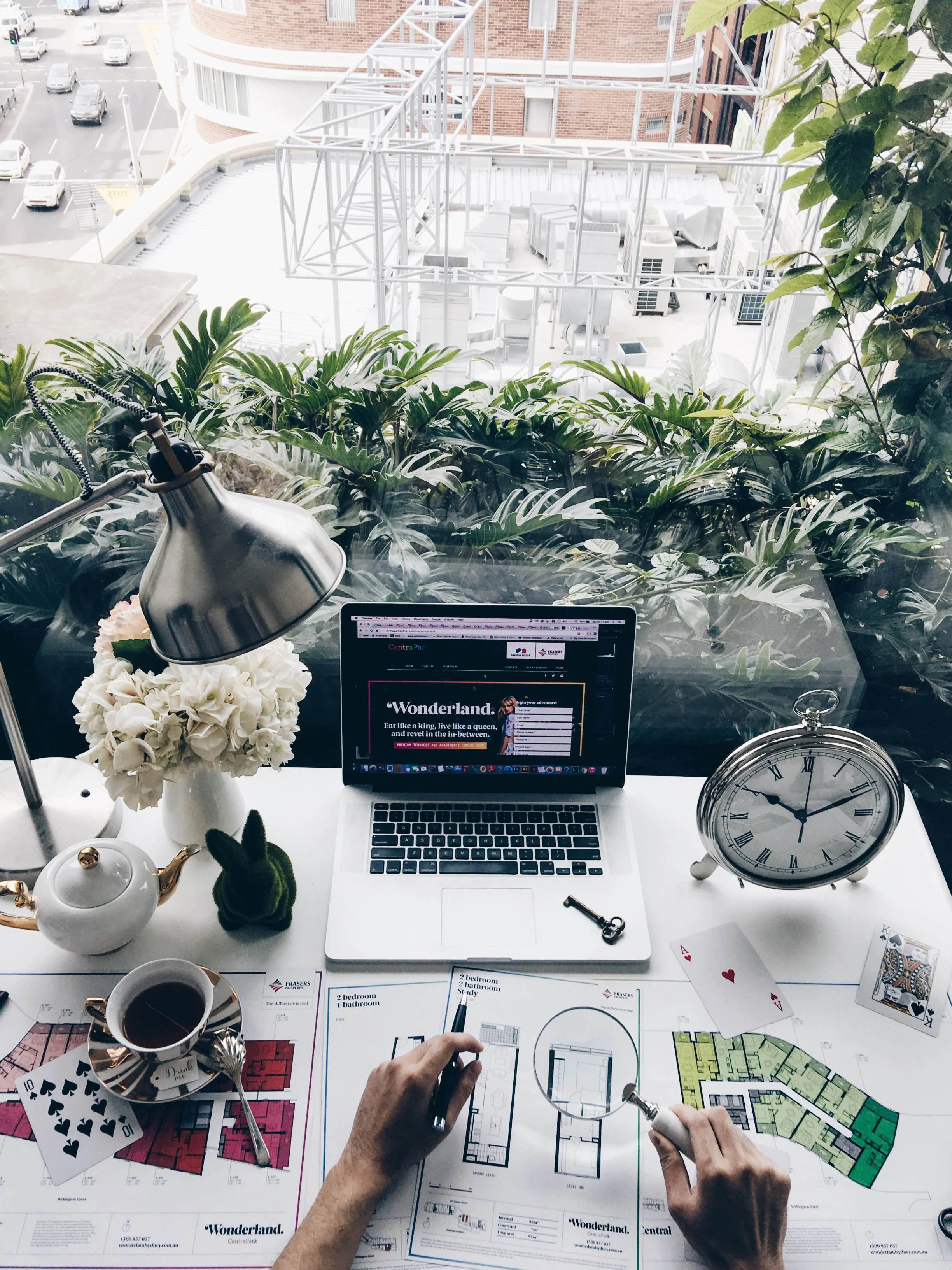I am usually the most productive when my work space is filled with lots of natural light away from all the noise pollution from the city. You'd think that living in the city would be loud and noisy, but behind these transparent walls I don't hear a thing. I love working from behind these vertical hanging gardens and I always feel inspired to keep on creating new content. 