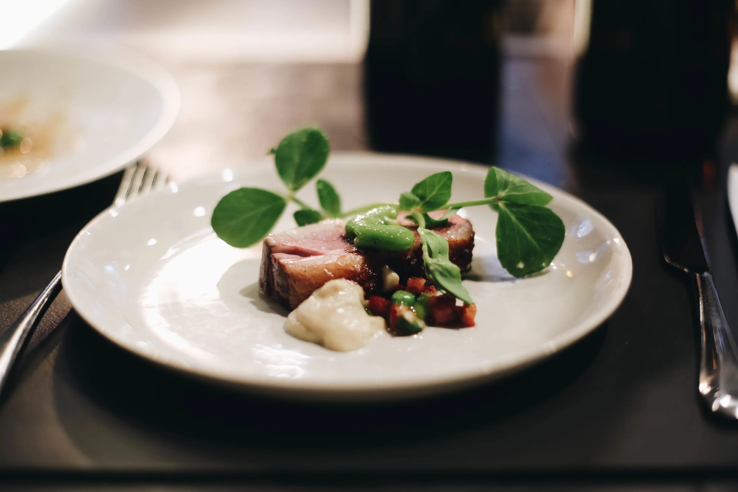 Lamb rump with garden peas