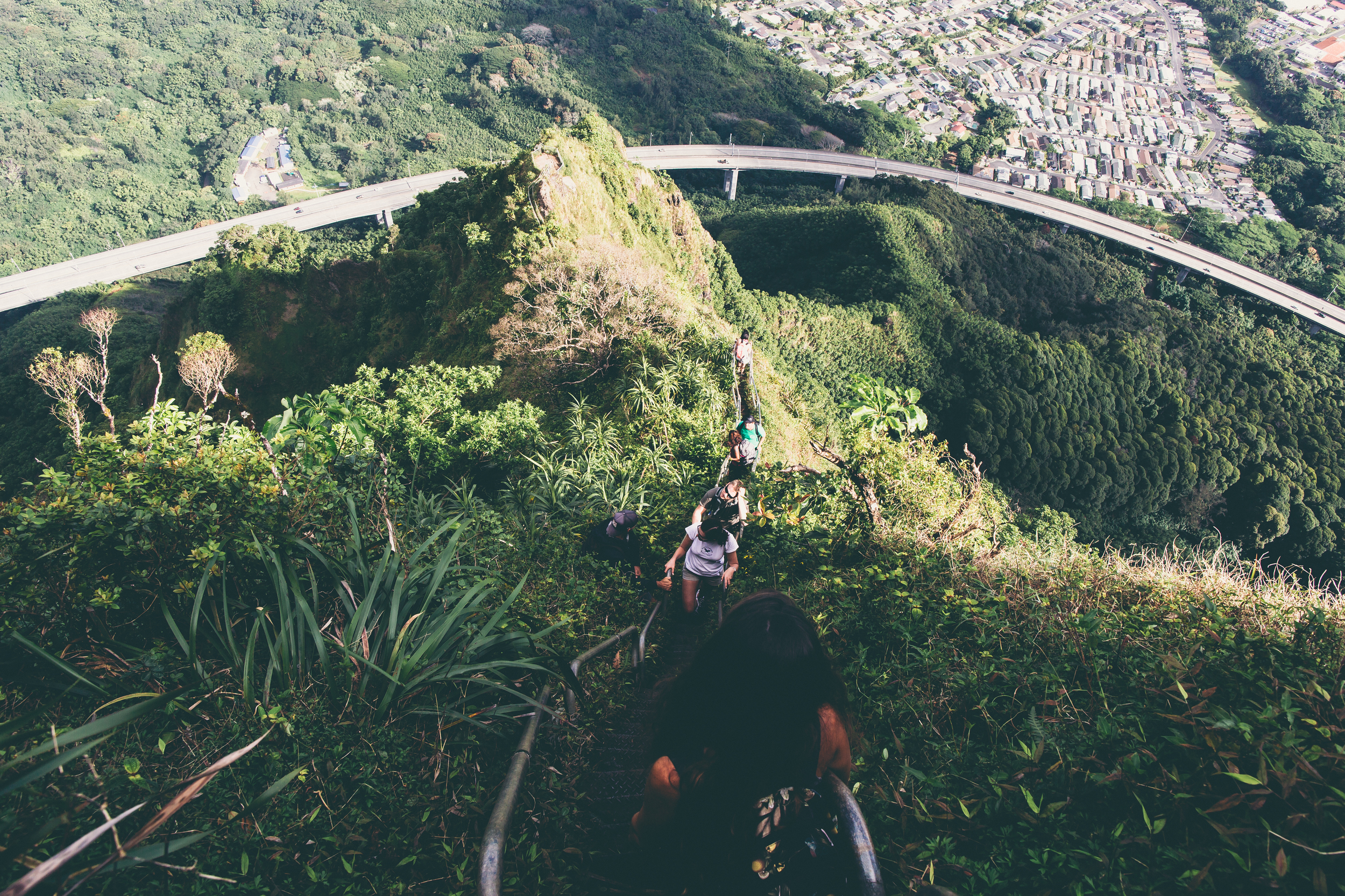 Haiku Stairs traffic jam. Four hikers doing a mid-day hike. HOT! (as in temperature, not as in an attractive way)