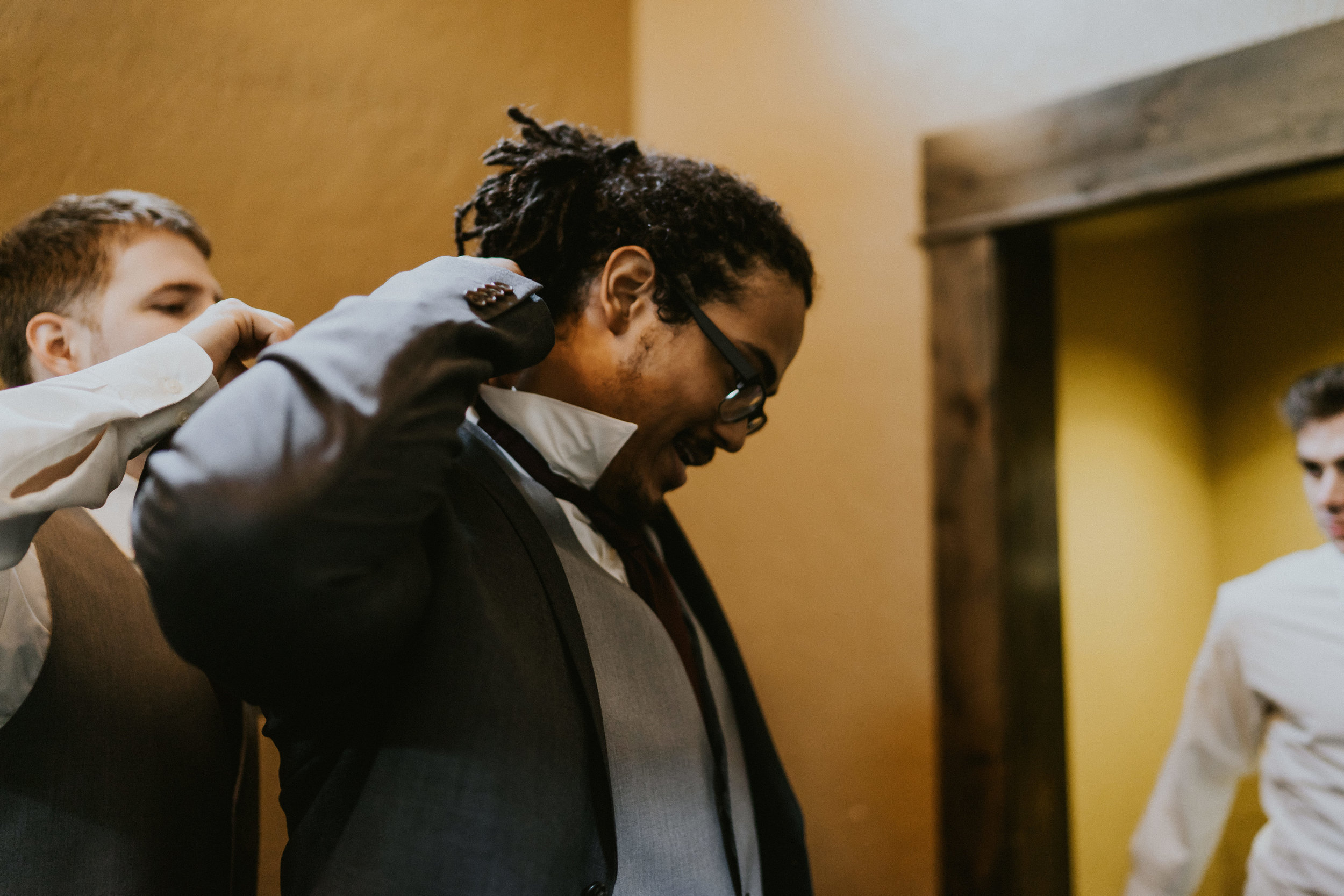 Groom getting ready wedding photography