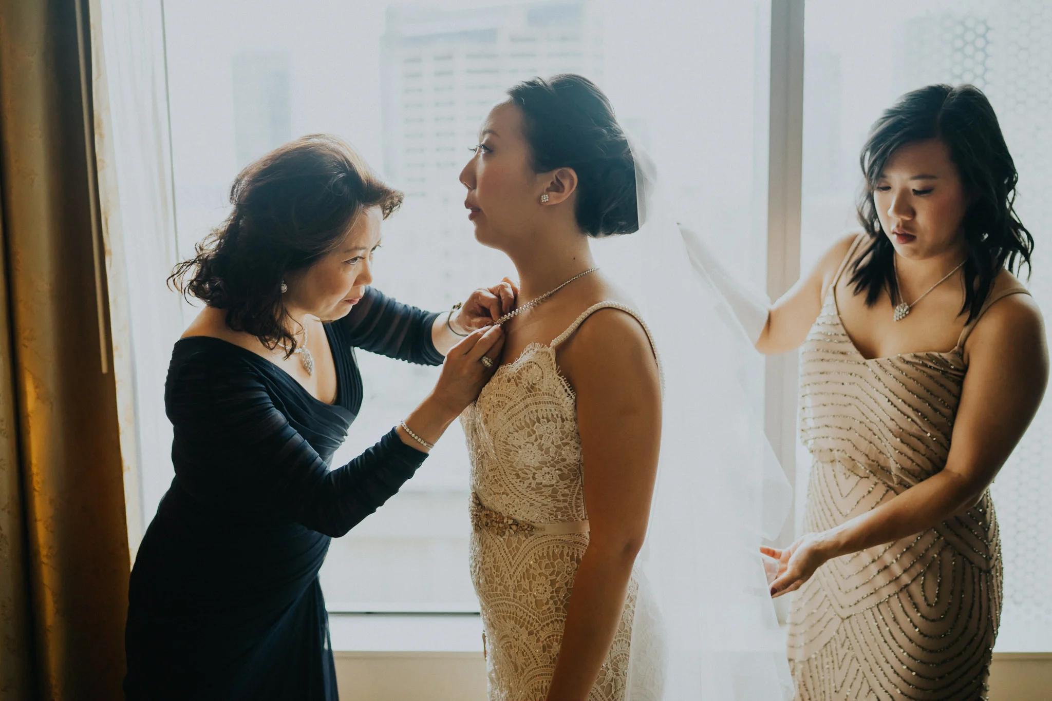 Mother daughters getting ready necklace