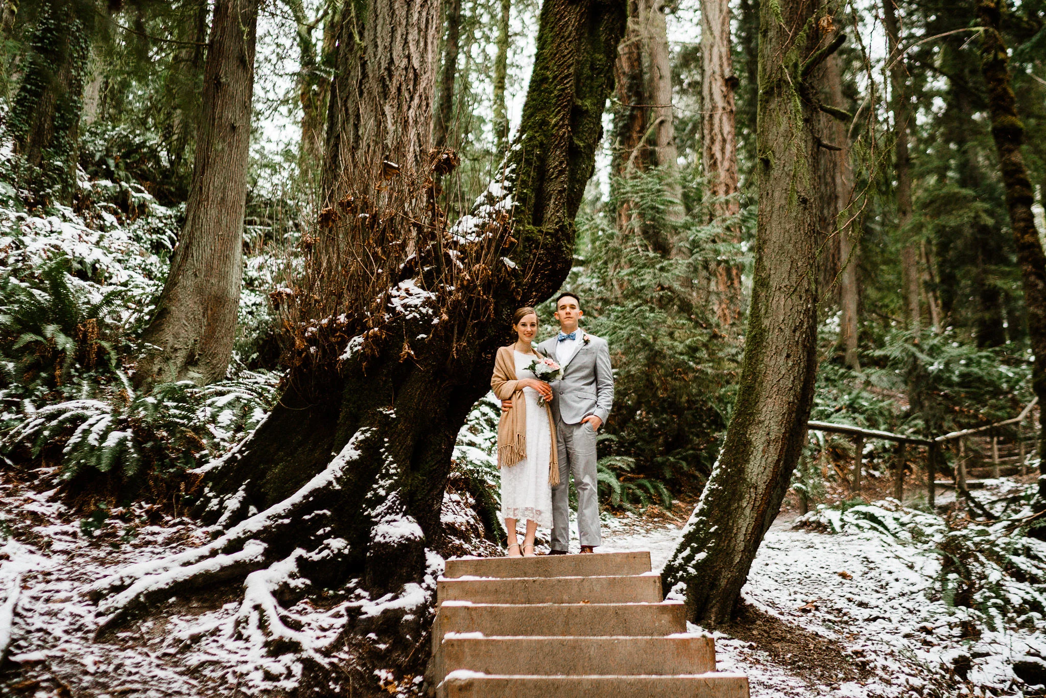 Bride groom snow portrait