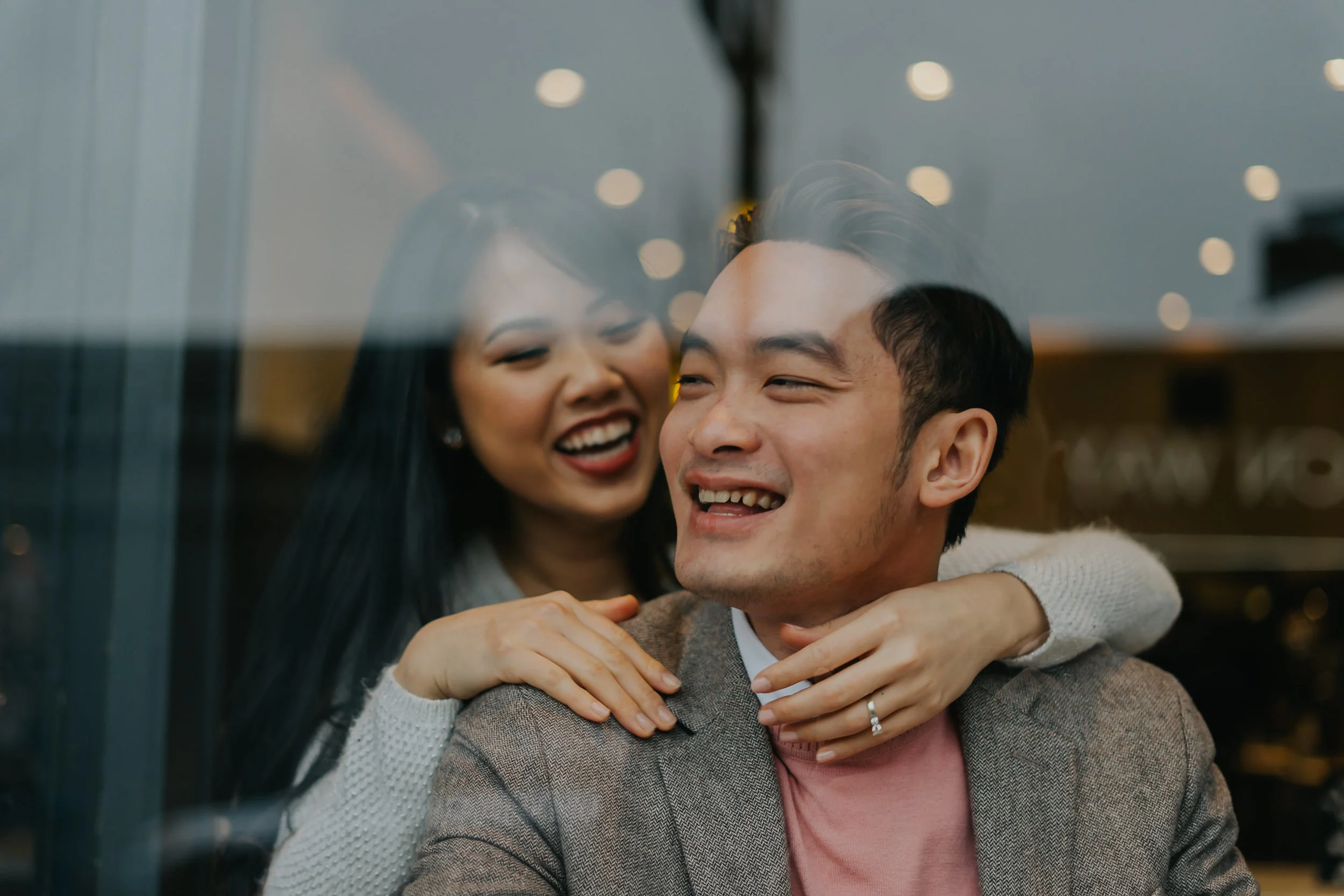engagement hug coffee shop photography