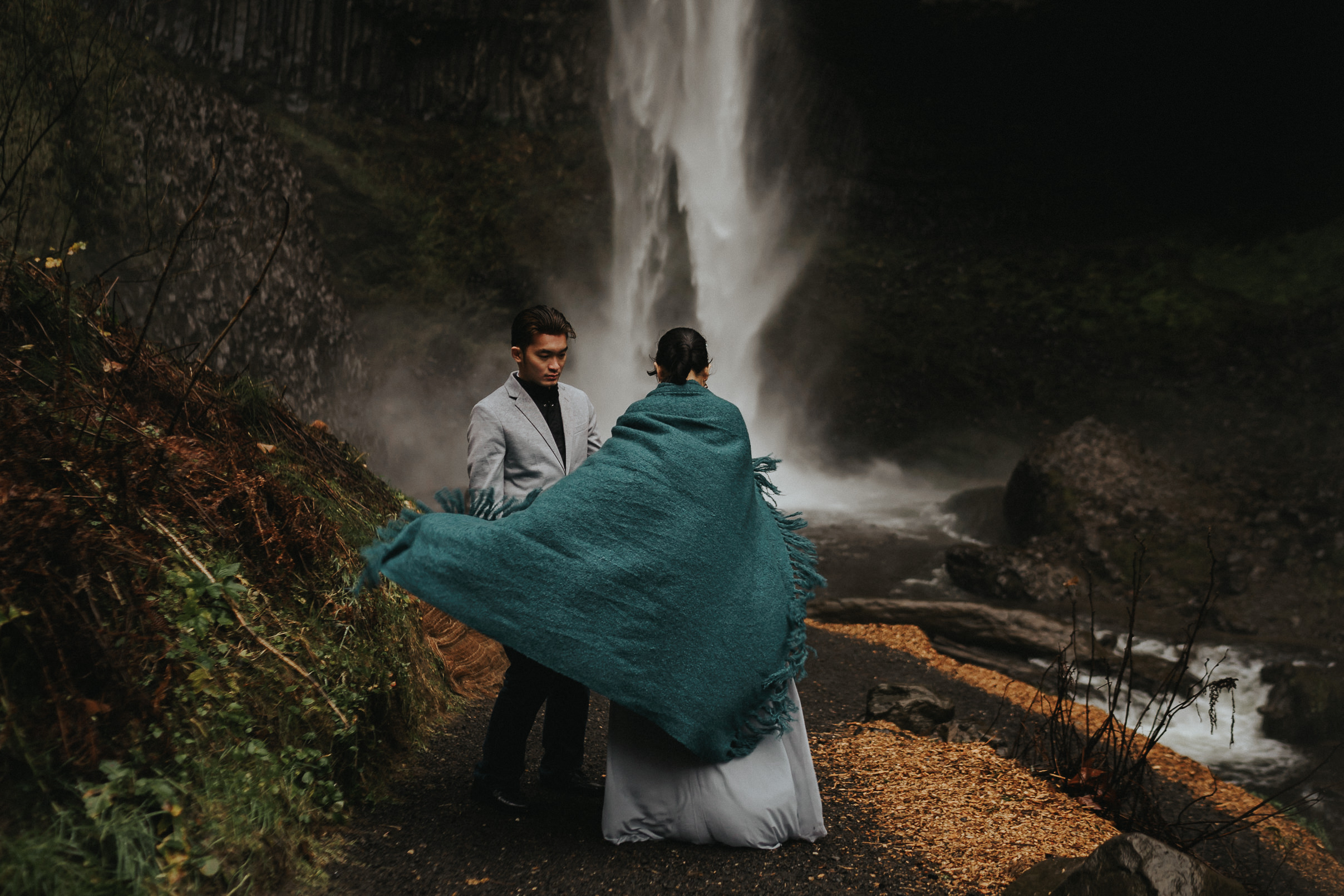 Dramatic moody engagement waterfall photography