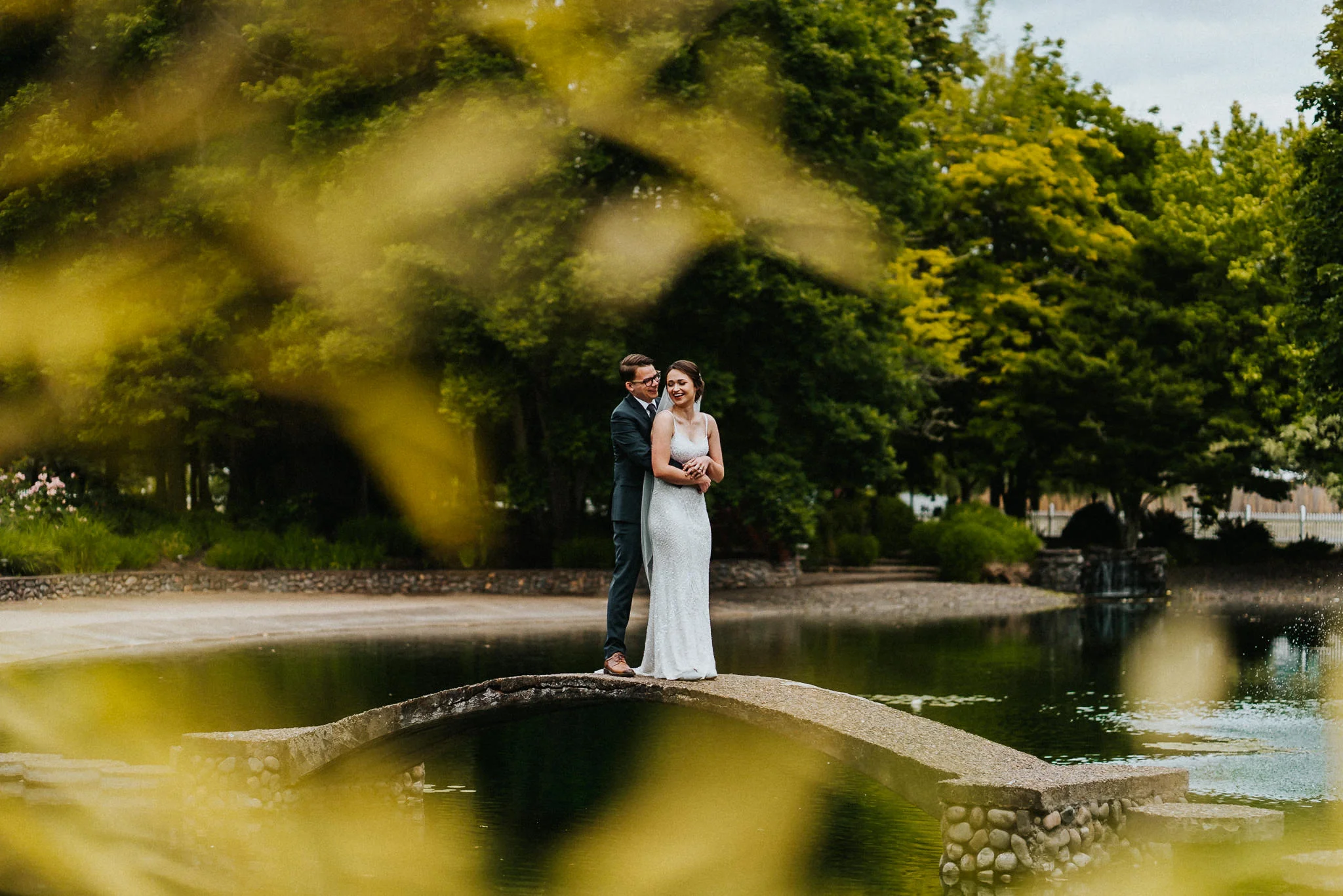 Dark Moody Wedding Portrait Bride Groom Bridge Water Bamboo Leaves