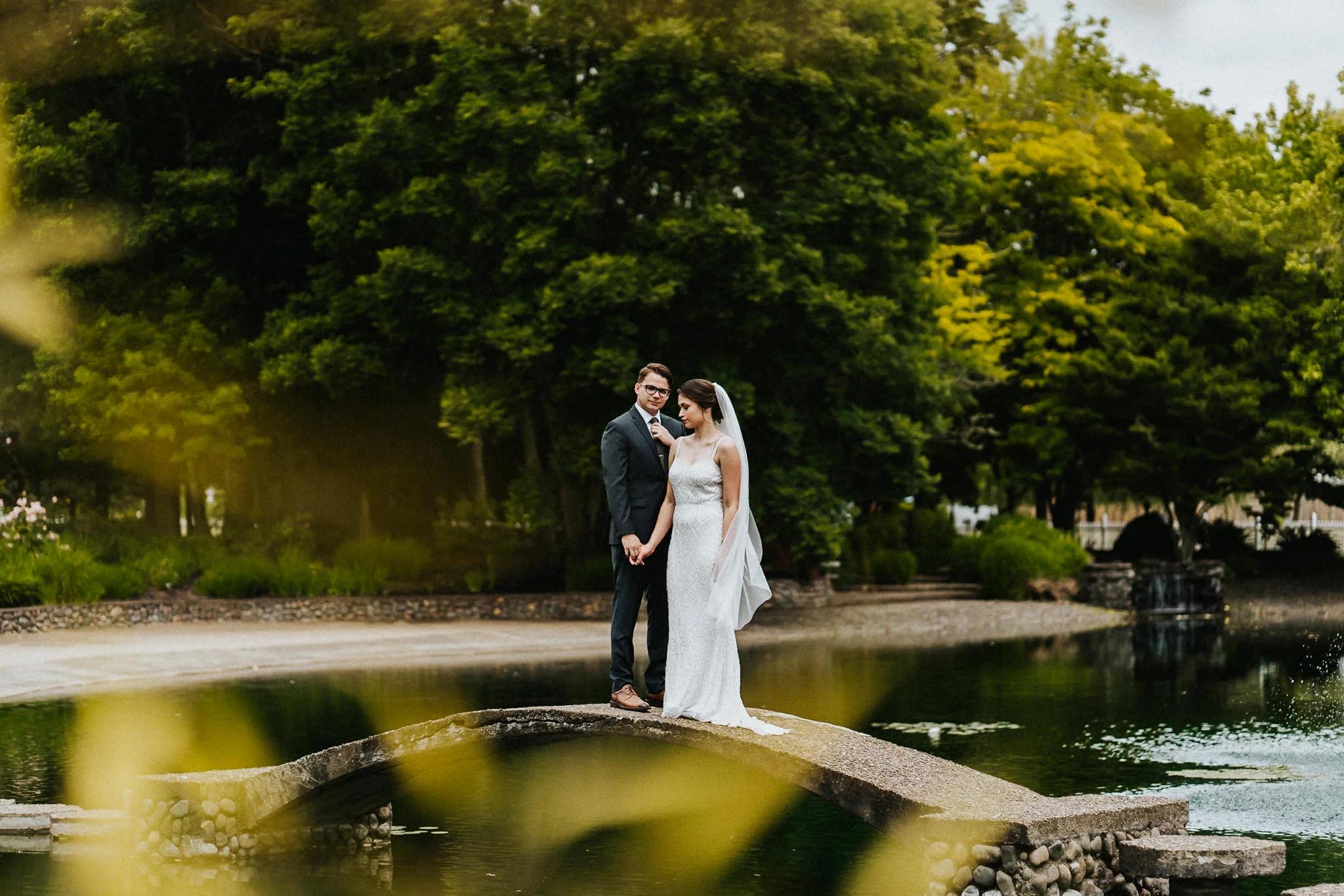 Dark Moody Wedding Portrait Bride Groom Bridge Water Stoic