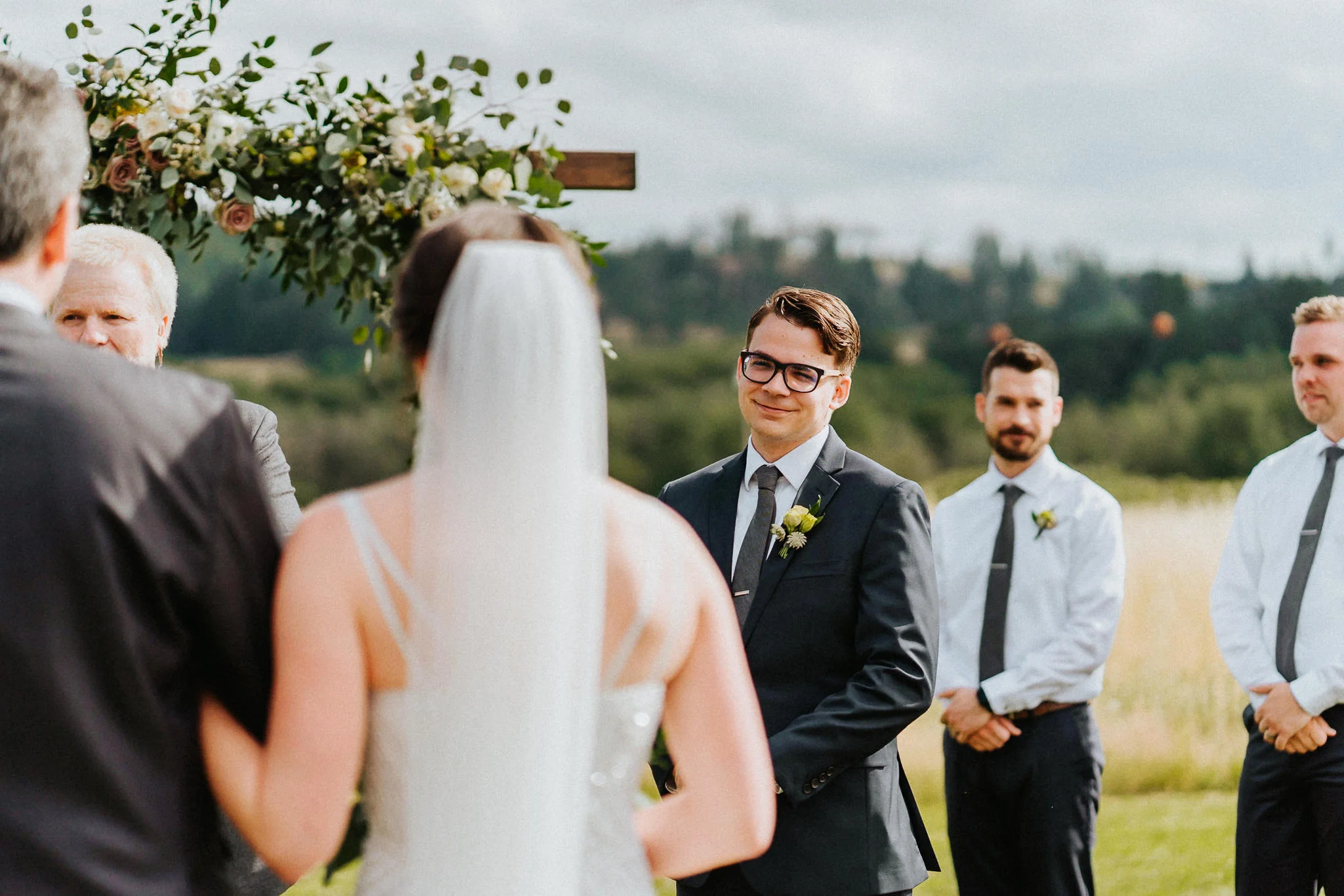 Groom Candid smile bride alter Water Oasis