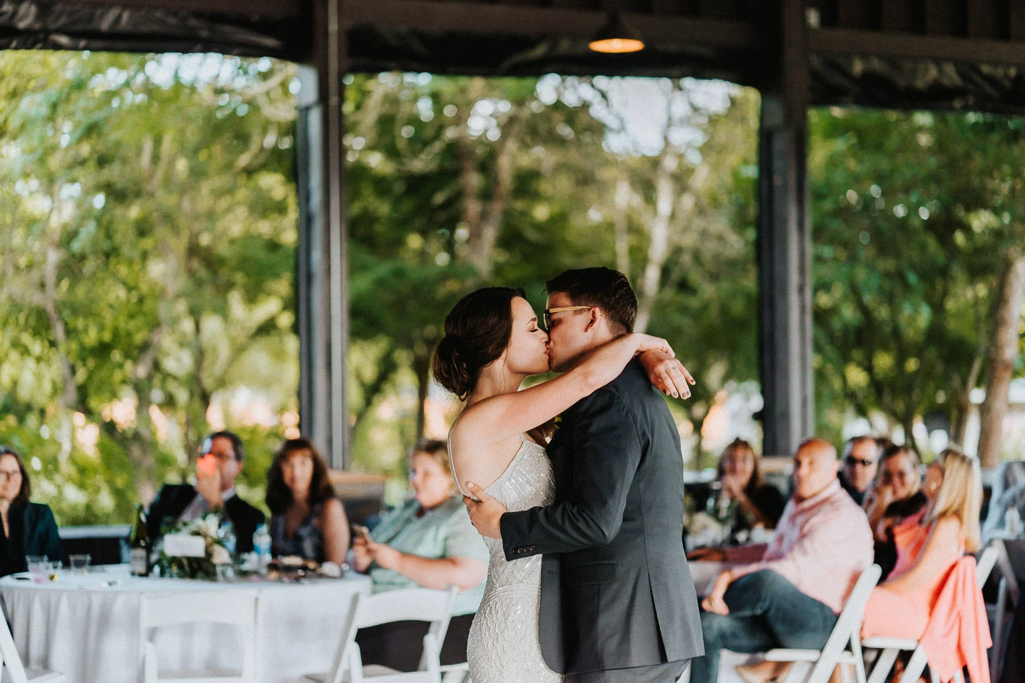 First Dance Kiss Water Oasis Wedding Natural Light