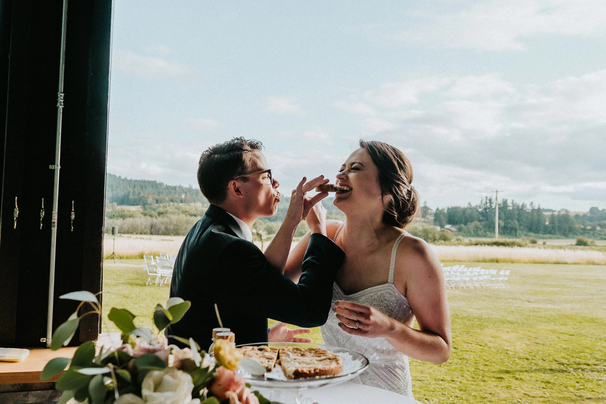Bride groom feed cake cookie Candid Wedding Photographer