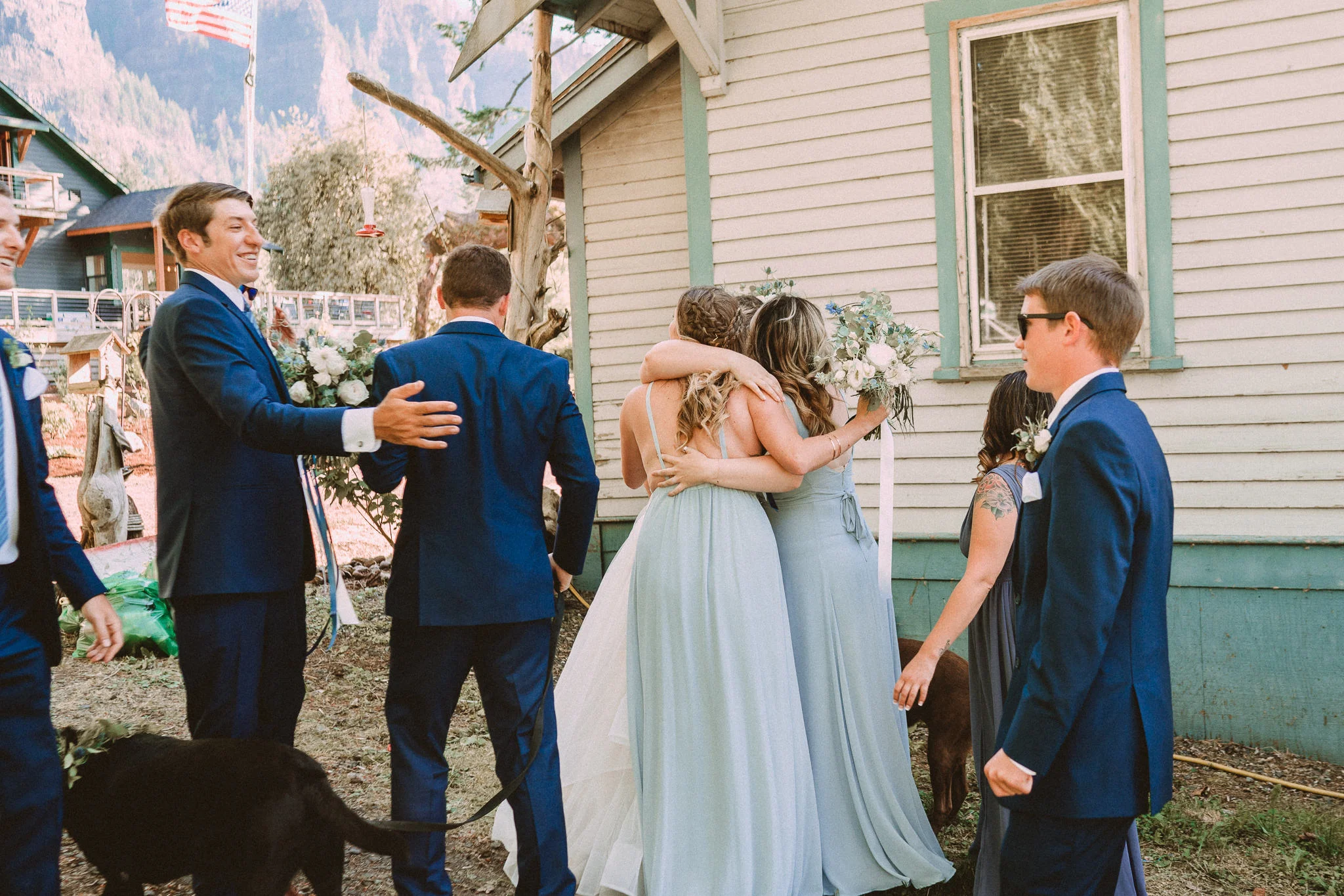 post ceremony Bridesmaid hug bride groomsmen wedding party Photographer Best of