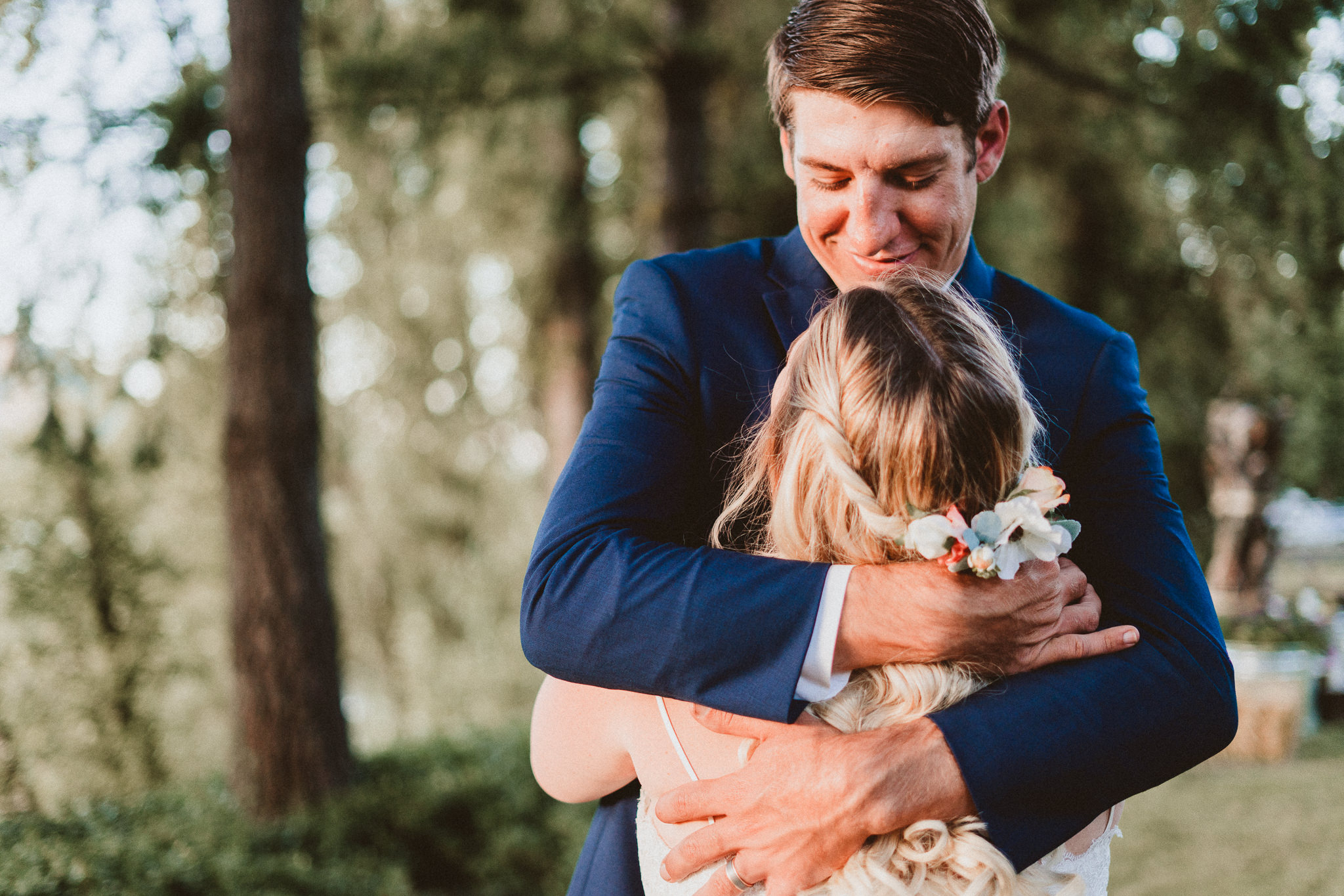 Groom hug bride sunset exposure wedding photography