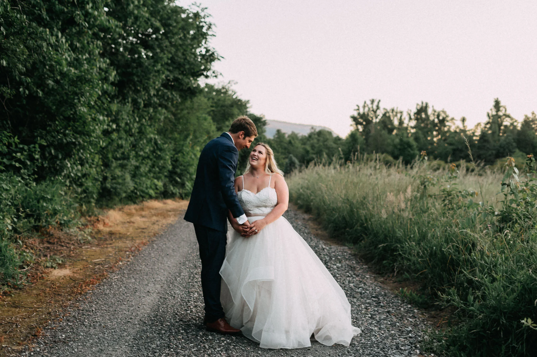 Groom kiss Bride Blue Suit Wedding Photography Portland Oregon