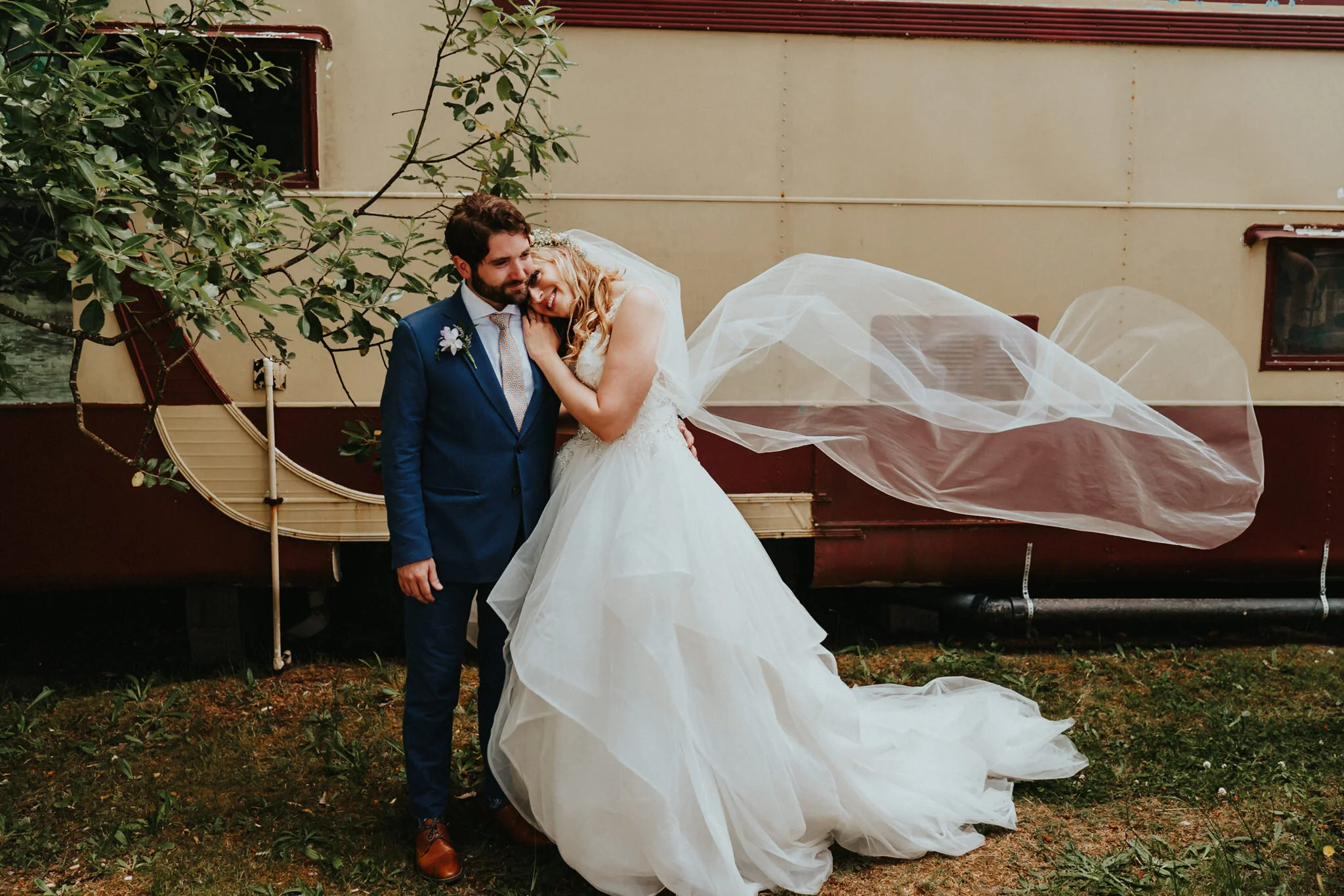 Groom Hug Bride Veil in Air Wedding Photographer Washington