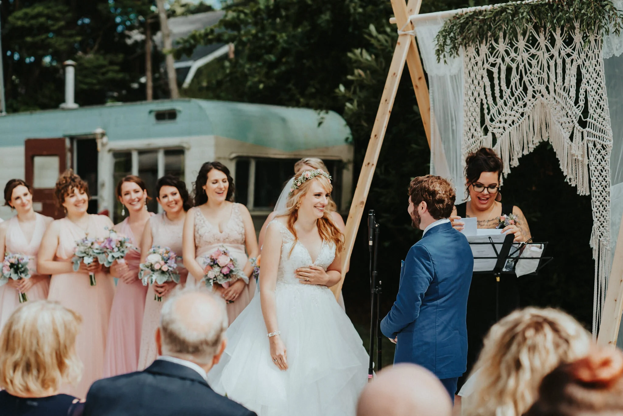 Bridesmaid shade coral dresses bride floral crown wedding photographer Washington