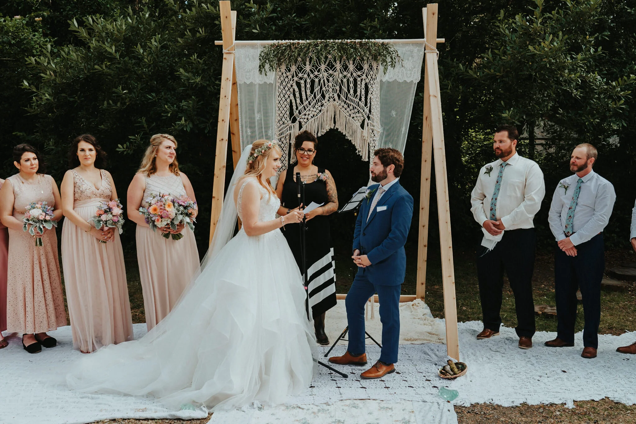 Bride reading vow boho wedding decor macarme