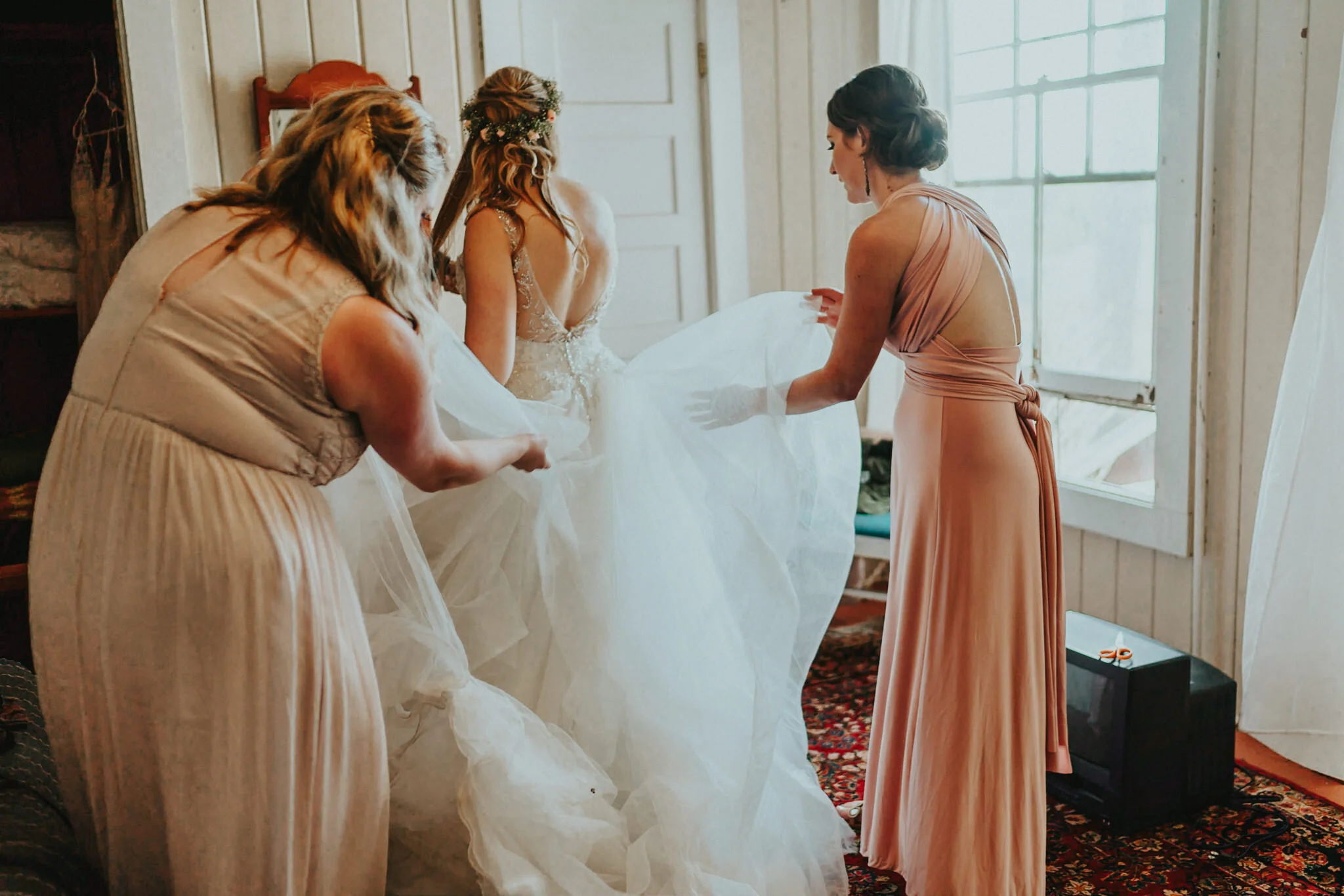 Bridesmaid help bride dress dark moody wedding Photographer Alfred Tang