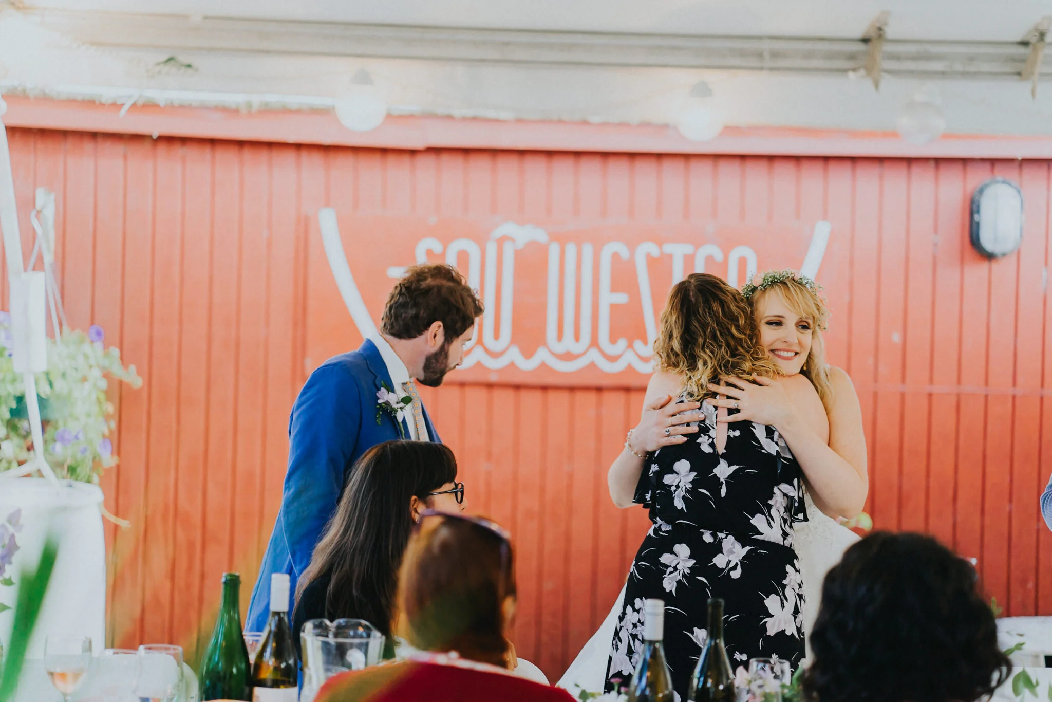 Bride hug groom reception Sou'Wester Red building Lodge Wedding Alfred Tang