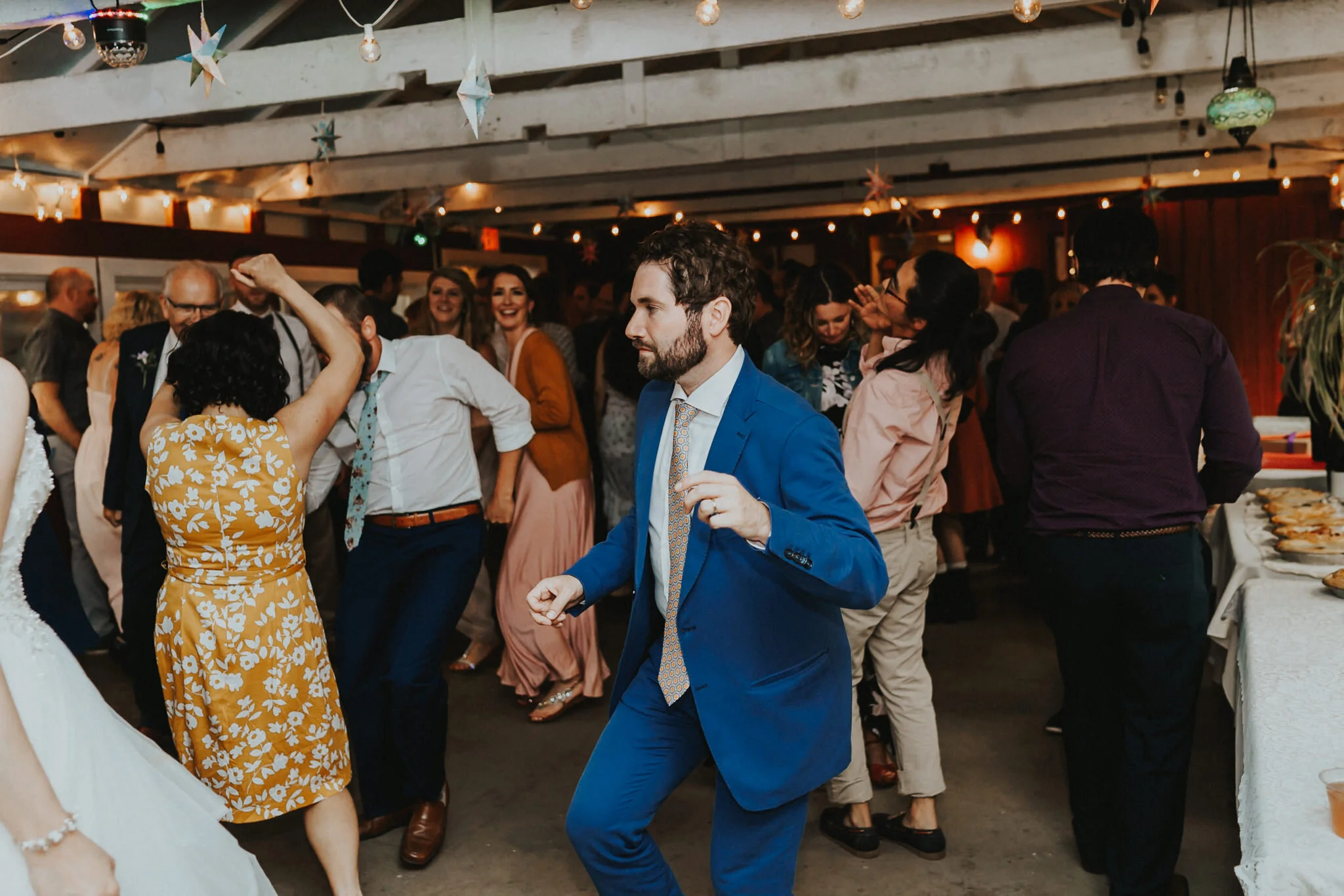 Groom dance reception on-camera flash wedding Photographer Alfred Tang