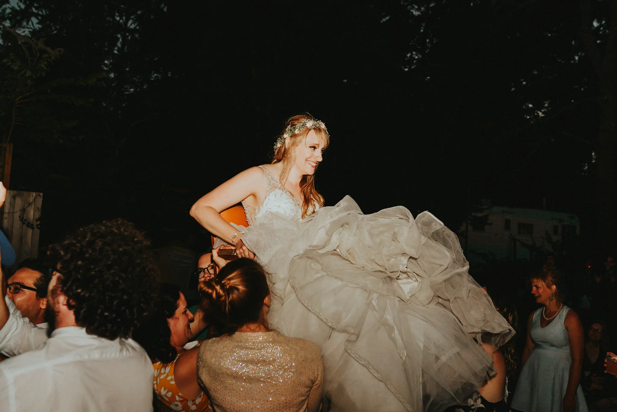 Bride Jewish wedding lifted on chair reception Washington Wedding Photographer Alfred Tang