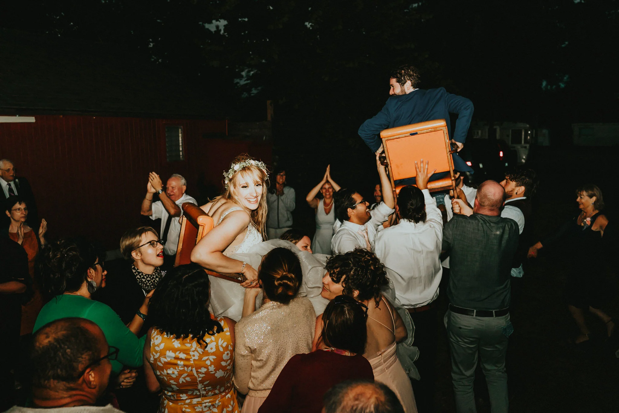 Bride Chair Lift Jewish wedding tradition photographer Alfred Tang