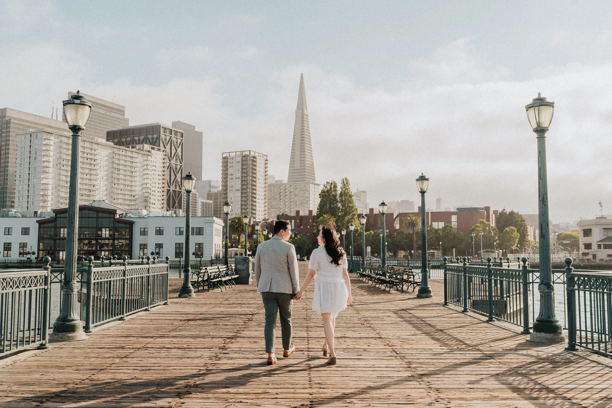 Walking hand in hand away in San Francisco.