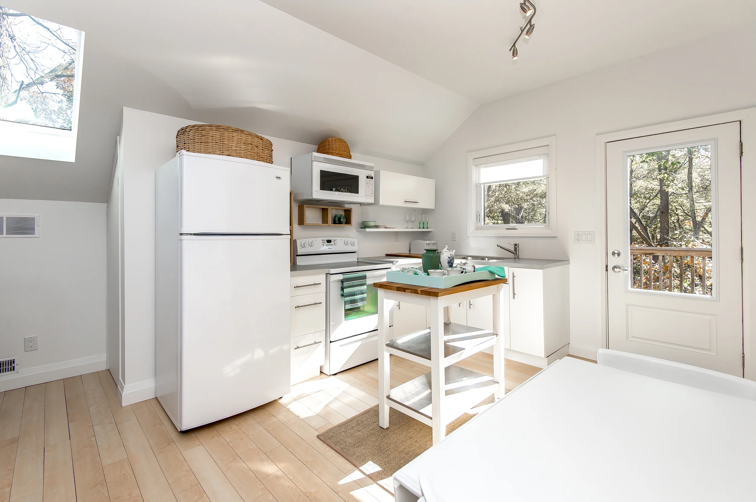 Kitchen door leads to private deck